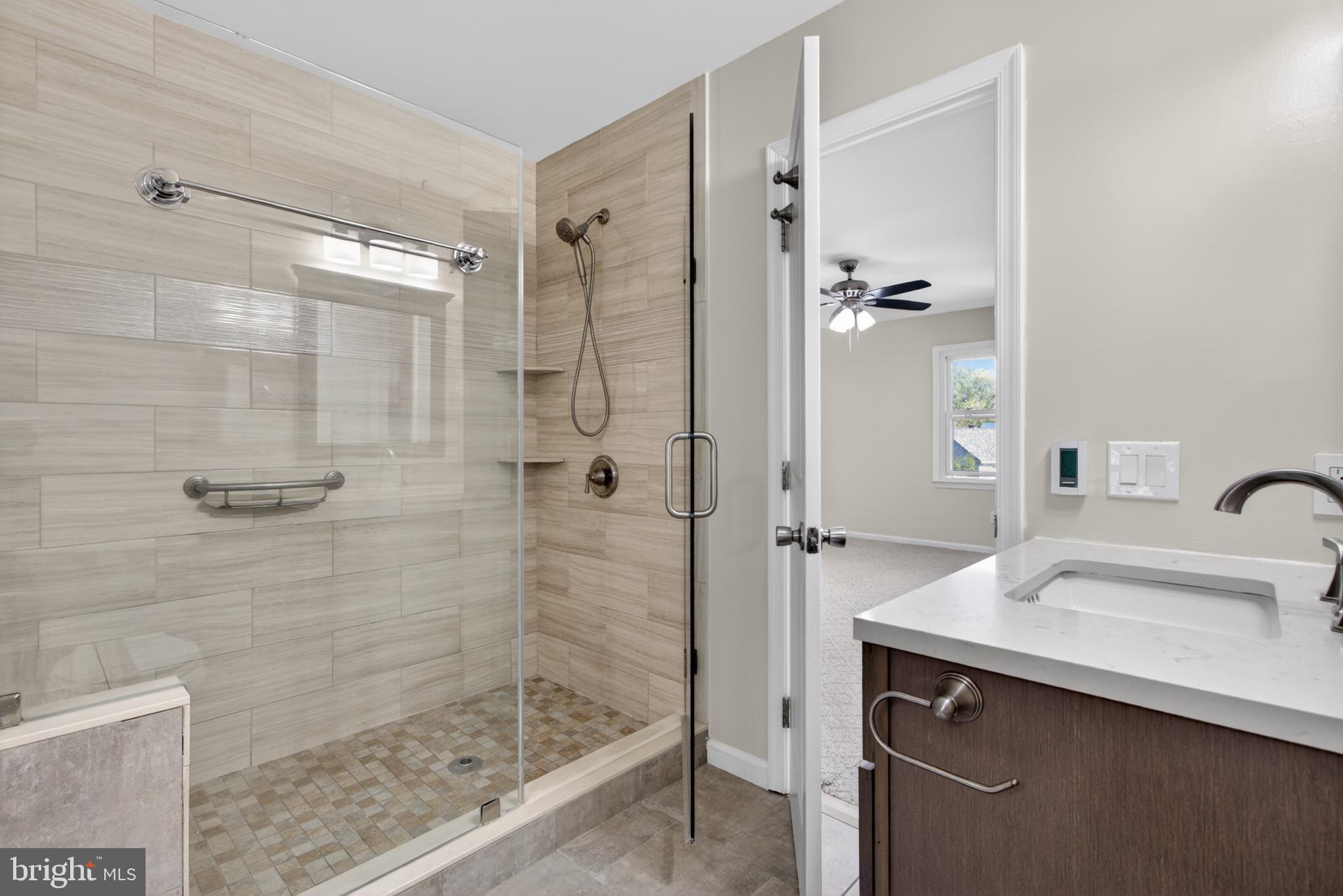 16 Redding Ridge Drive Gaithersburg, MD 20878 - Photo 26 of 53 Modern bathroom with sleek design.