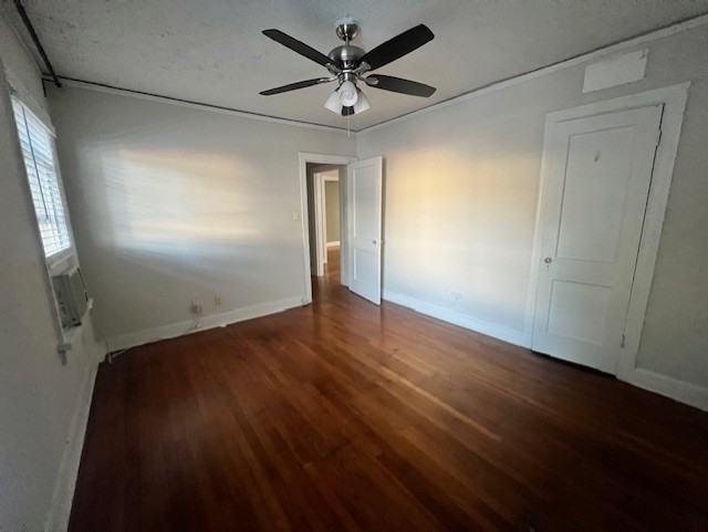 1817 Colquitt Street, Unit GARAGE Houston, TX 77098 - Photo 4 of 6 an empty room with wooden floor and a ceiling fan