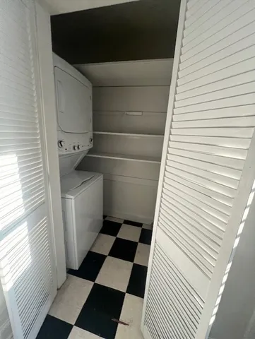 a bathroom with a sink a toilet and a window