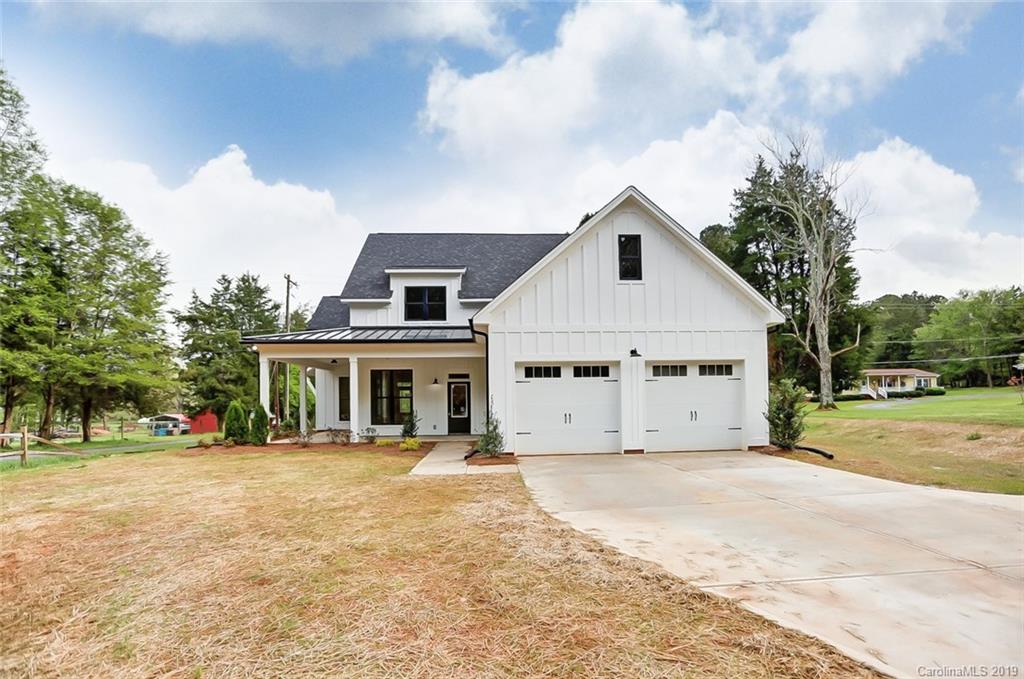 846 Union New Hope Road Gastonia, NC 28056 - Photo 1 of 41 a view of house with yard and trees in the background