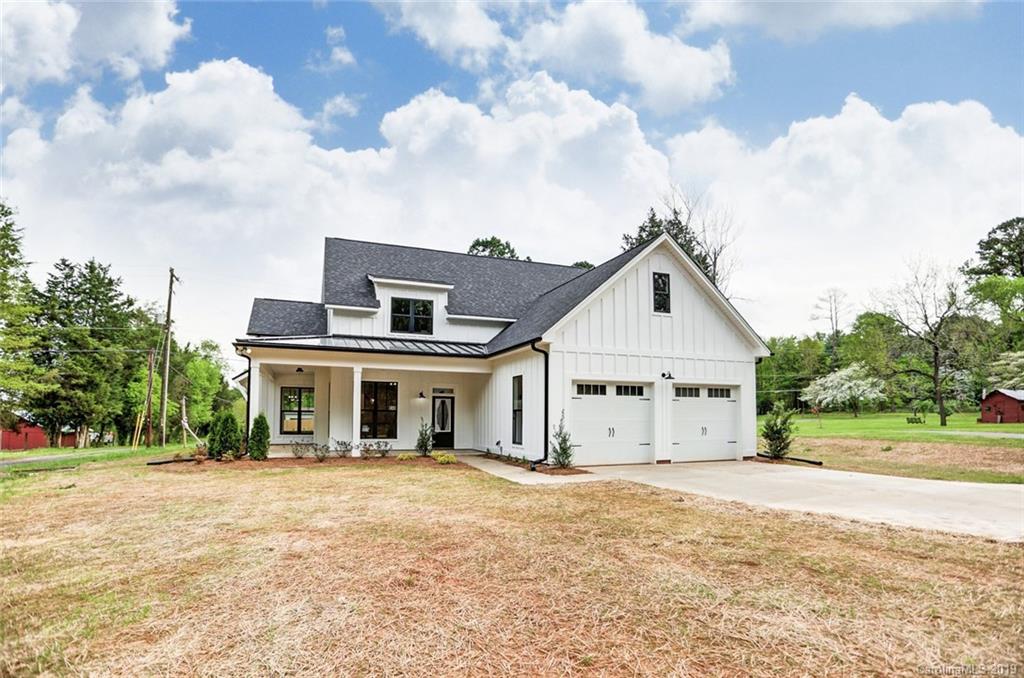846 Union New Hope Road Gastonia, NC 28056 - Photo 2 of 41 a front view of a house with a yard