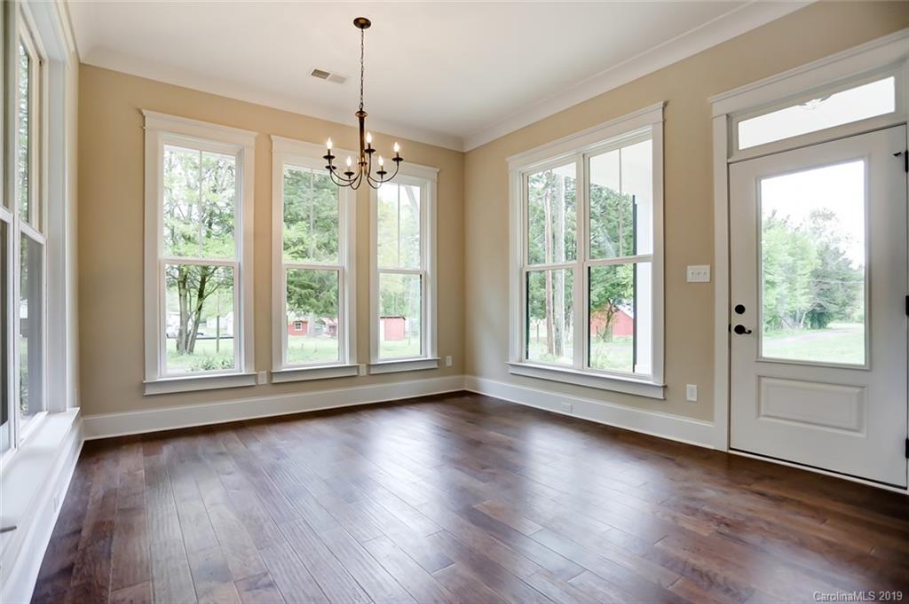 846 Union New Hope Road Gastonia, NC 28056 - Photo 15 of 41 a view of an empty room with wooden floor and a window