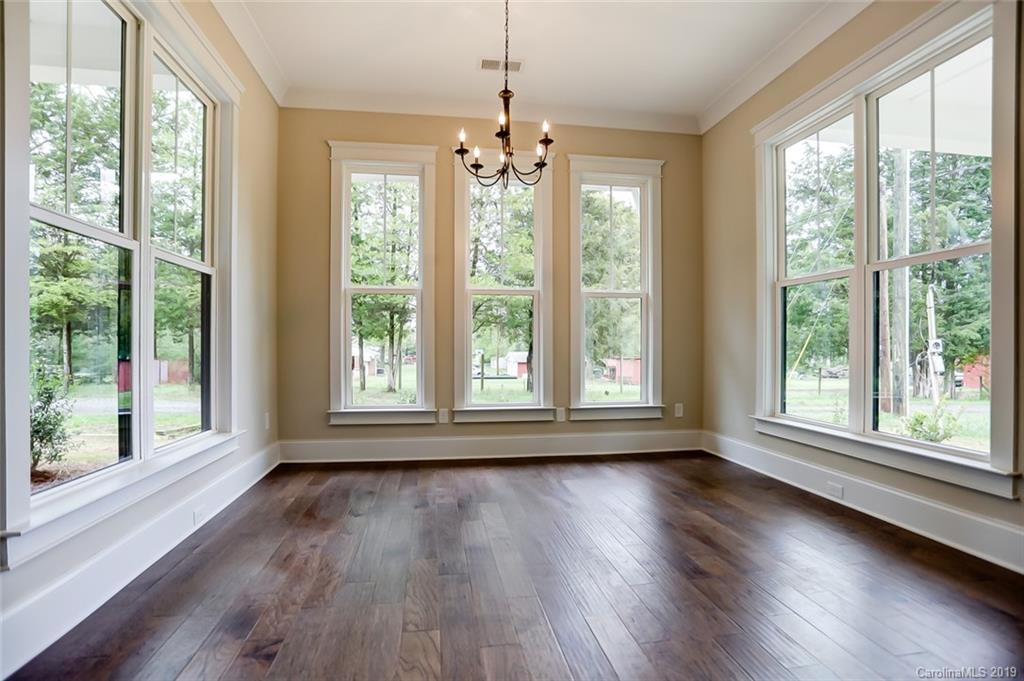 846 Union New Hope Road Gastonia, NC 28056 - Photo 16 of 41 a view of livingroom with window wooden floor and front door