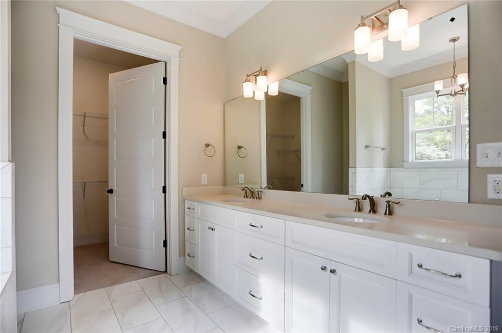 846 Union New Hope Road Gastonia, NC 28056 - Photo 20 of 41 a bathroom with a double vanity sink mirror and next to a window