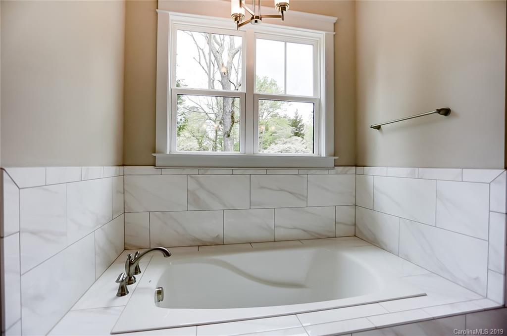 846 Union New Hope Road Gastonia, NC 28056 - Photo 23 of 41 a bathroom with a bathtub