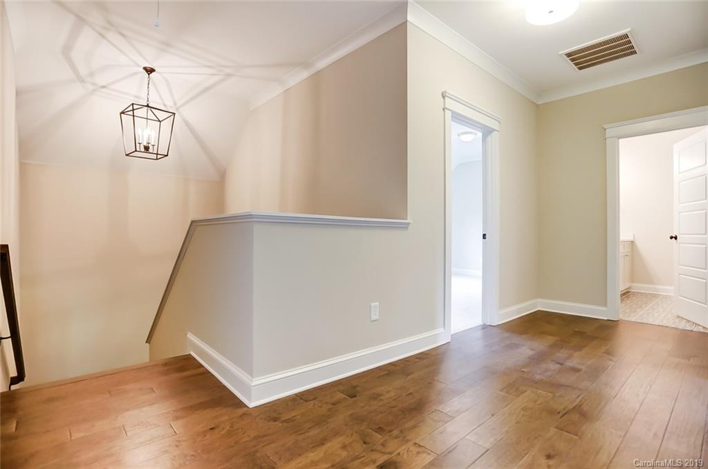 846 Union New Hope Road Gastonia, NC 28056 - Photo 24 of 41 an empty room with wooden floor and windows