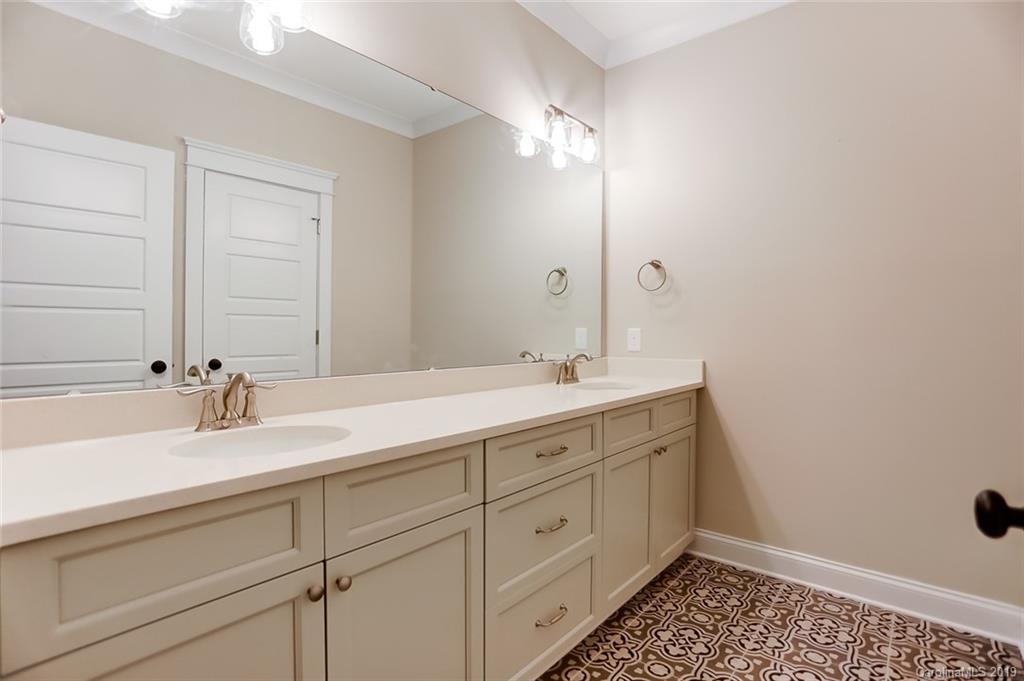 846 Union New Hope Road Gastonia, NC 28056 - Photo 27 of 41 a bathroom with a sink and a mirror