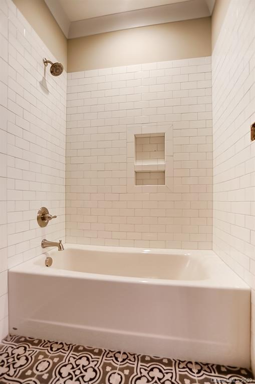 846 Union New Hope Road Gastonia, NC 28056 - Photo 28 of 41 a bathroom with a bathtub