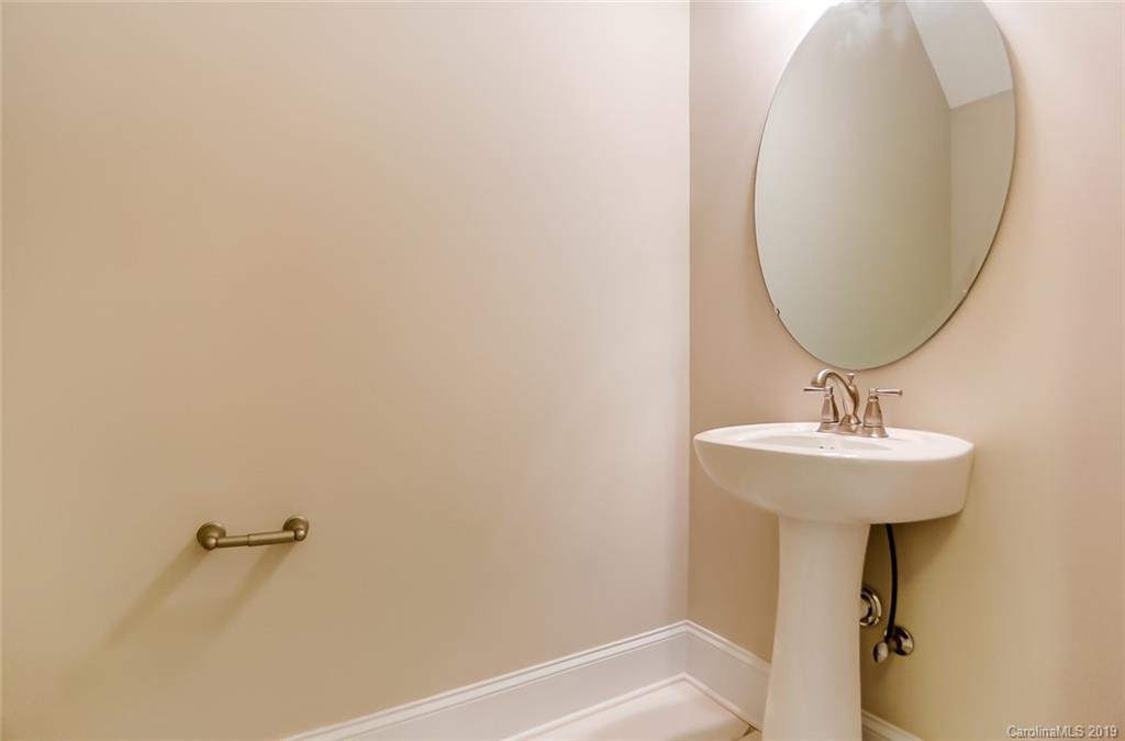 846 Union New Hope Road Gastonia, NC 28056 - Photo 35 of 41 a bathroom with a sink a mirror and a bathtub