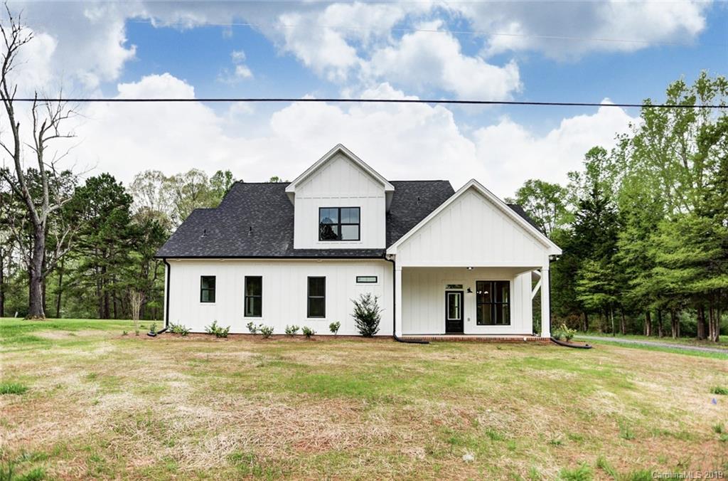 846 Union New Hope Road Gastonia, NC 28056 - Photo 36 of 41 a view of a house with a backyard