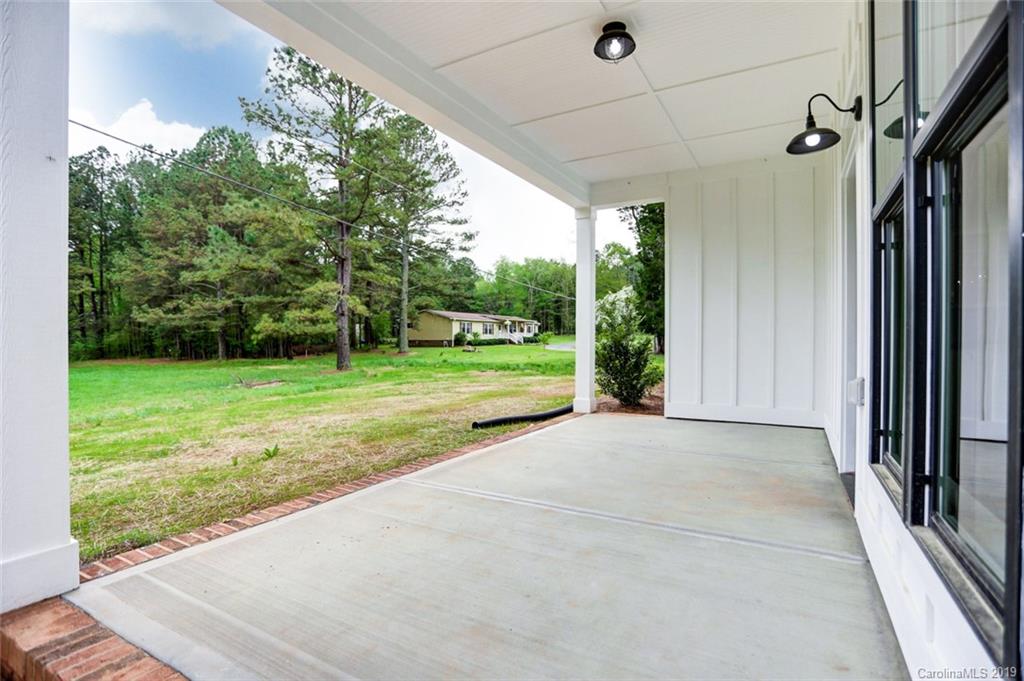 846 Union New Hope Road Gastonia, NC 28056 - Photo 38 of 41 a view of a porch with a backyard
