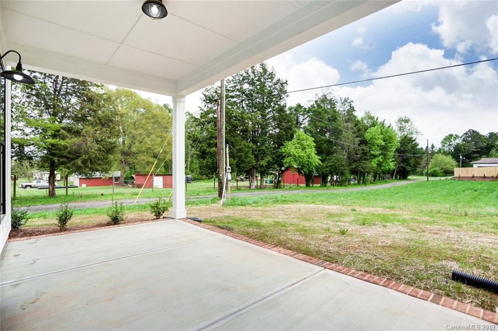 846 Union New Hope Road Gastonia, NC 28056 - Photo 39 of 41 a view of a house with a big yard and potted plants
