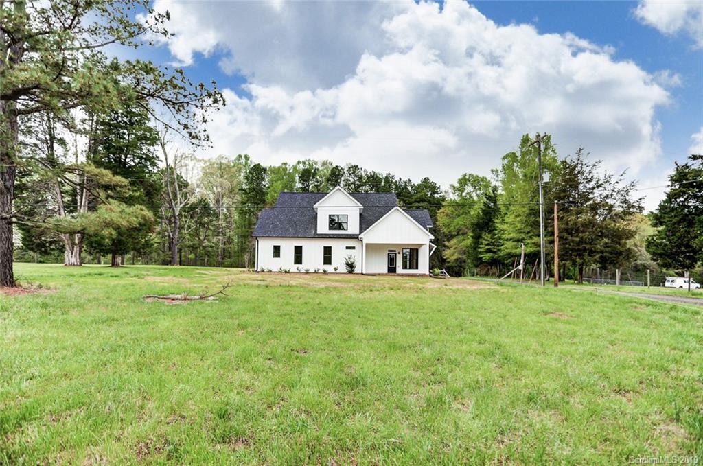 846 Union New Hope Road Gastonia, NC 28056 - Photo 41 of 41 a view of a house with a big yard and large trees