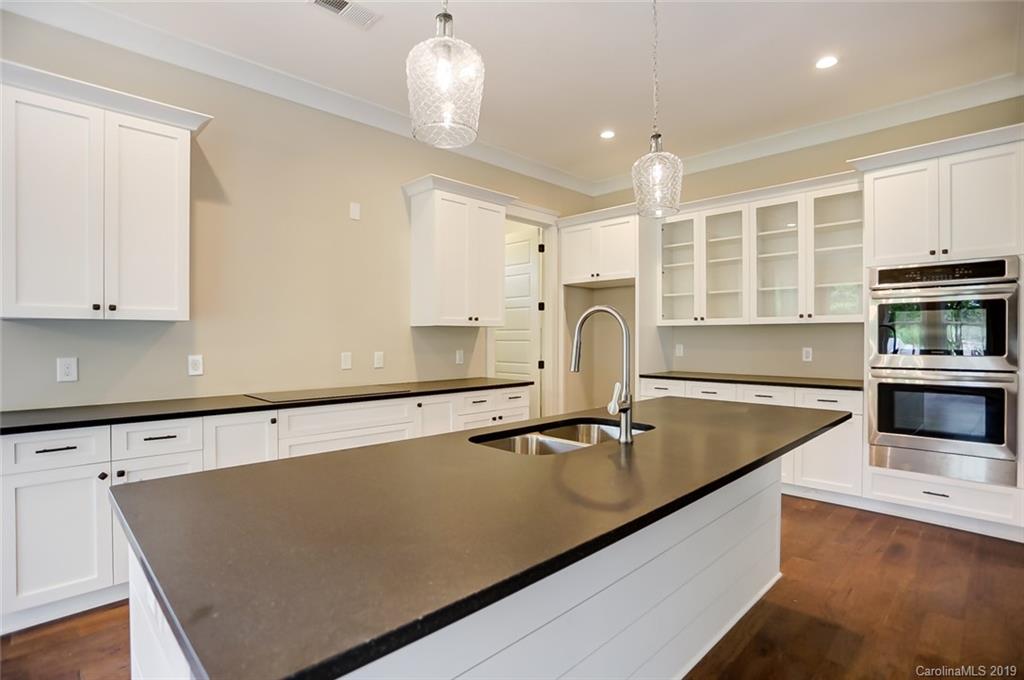 846 Union New Hope Road Gastonia, NC 28056 - Photo 10 of 41 a kitchen with stainless steel appliances granite countertop a sink a stove and a refrigerator