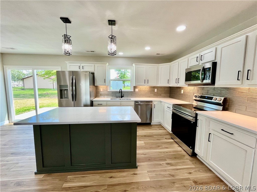 602 West 4th Street Stover, MO 65078 - Photo 8 of 33 Kitchen - quartz countertops