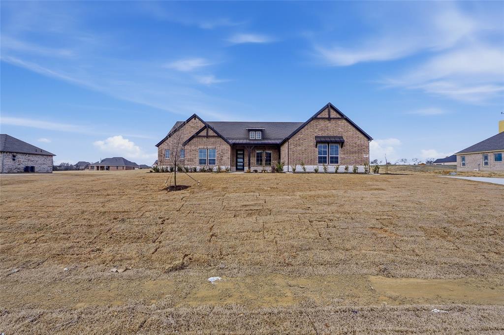 808 Vly Rdg Road Van Alstyne, TX 75495 - Photo 2 of 39 a view of house with yard