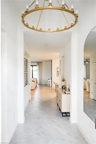 a view of a livingroom with a tub and couches