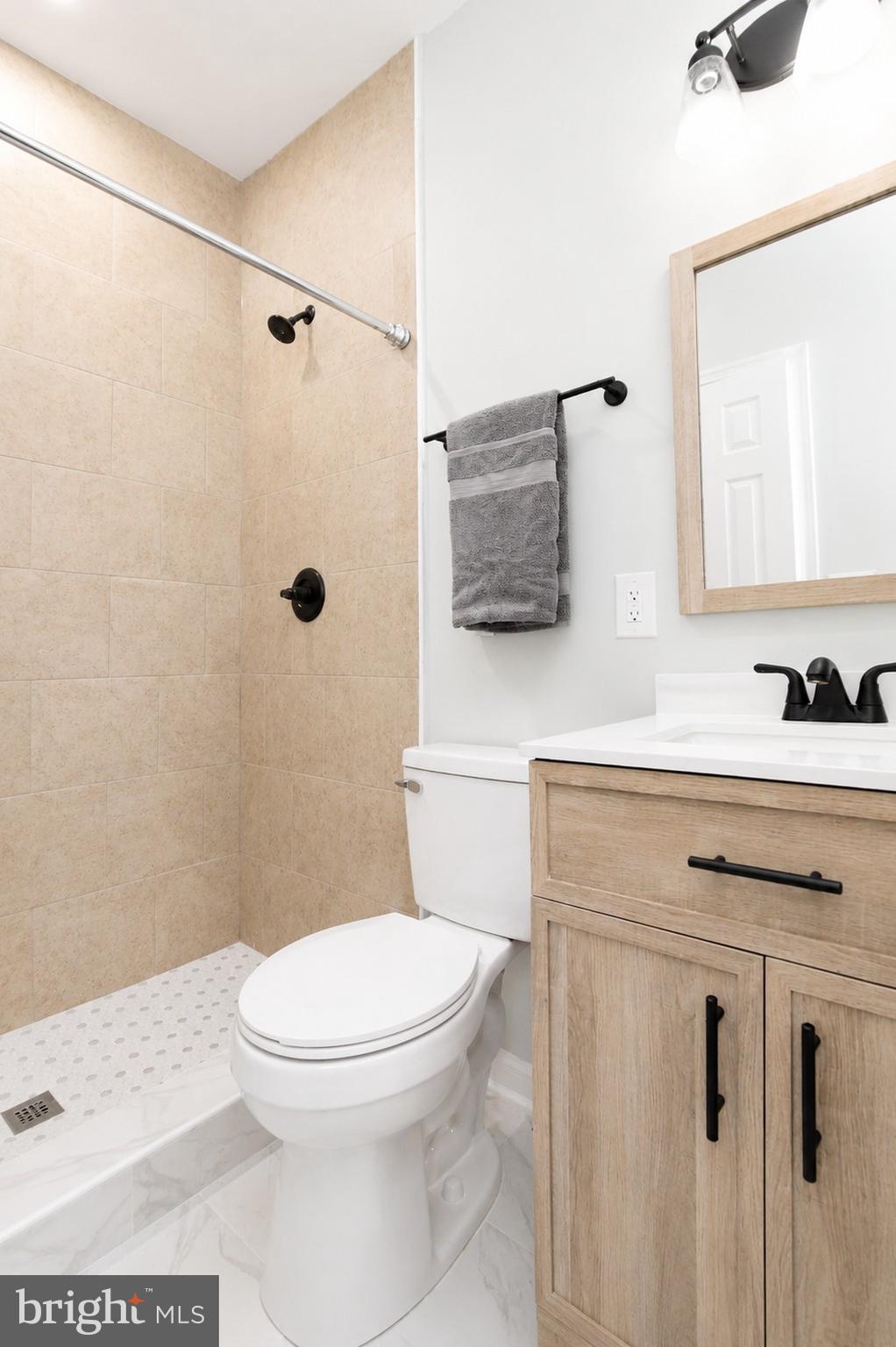 4319 Hadamar Road Spotsylvania, VA 22551 - Photo 24 of 24 a bathroom with a toilet sink and shower