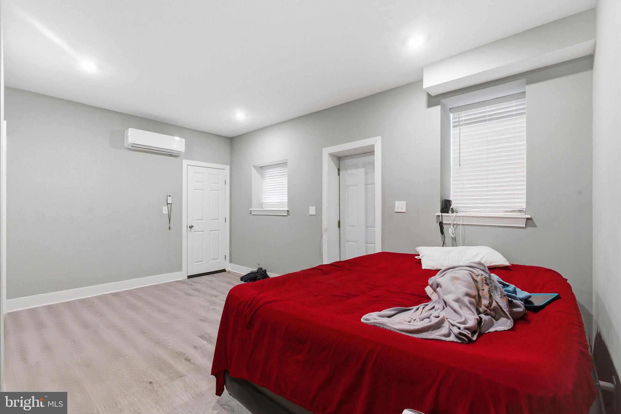 1813 South 23rd Street Philadelphia, PA 19145 - Photo 5 of 23 a bedroom with a bed and a window