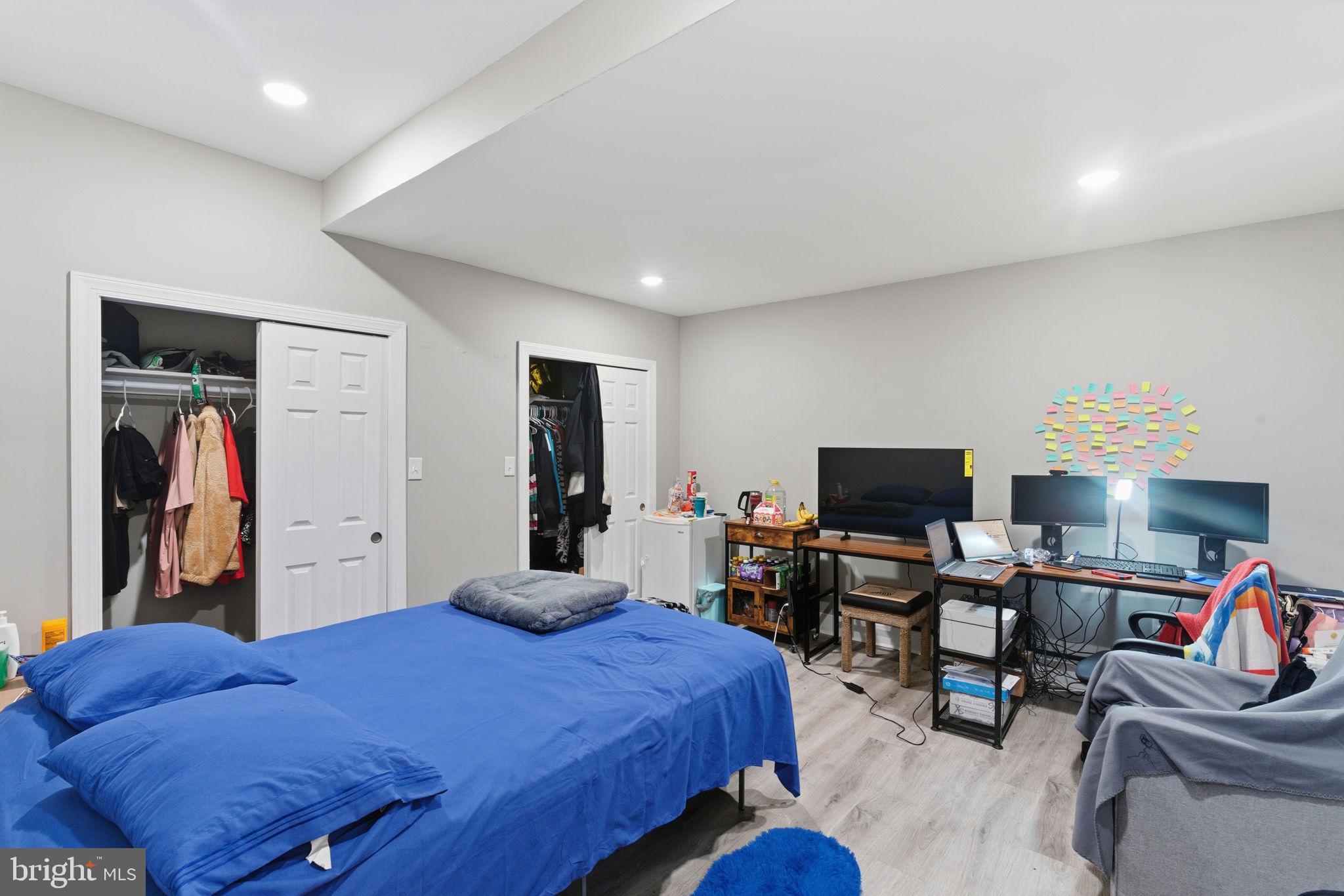 1813 South 23rd Street Philadelphia, PA 19145 - Photo 8 of 23 a bed room with a bed and a television