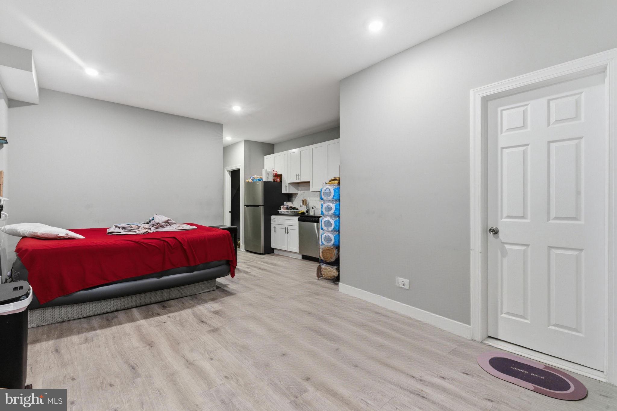 1813 South 23rd Street Philadelphia, PA 19145 - Photo 9 of 23 a bed room with a bed and a window