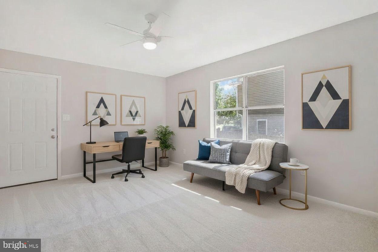 251 Cape St John Road Annapolis, MD 21401 - Photo 12 of 61 a living room with furniture and a window