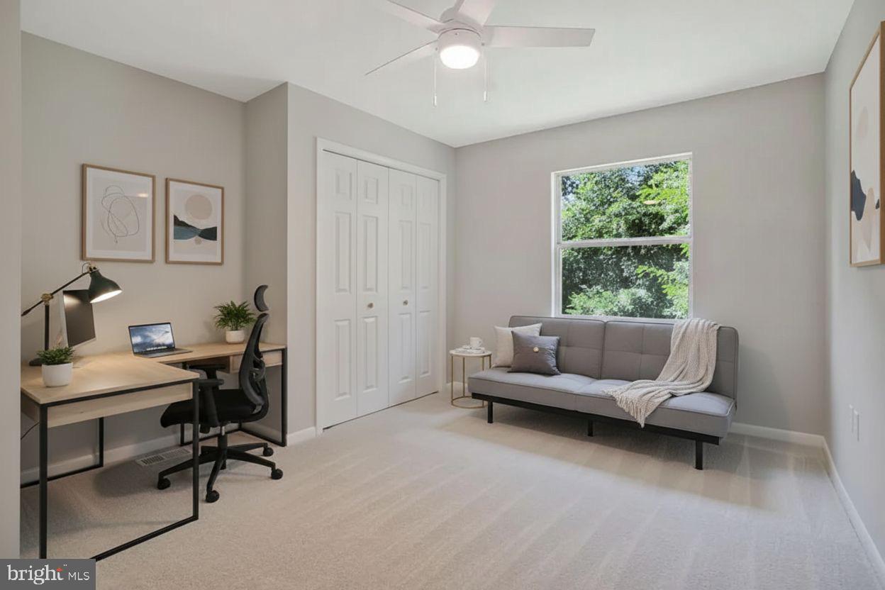 251 Cape St John Road Annapolis, MD 21401 - Photo 13 of 61 a living room with furniture and a window