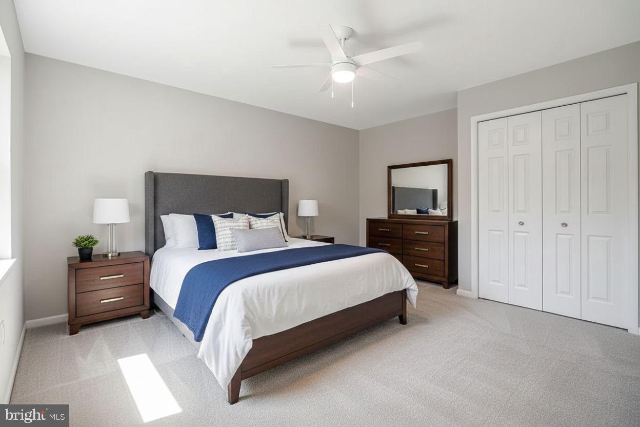 251 Cape St John Road Annapolis, MD 21401 - Photo 15 of 61 a bed room with a bed and a television