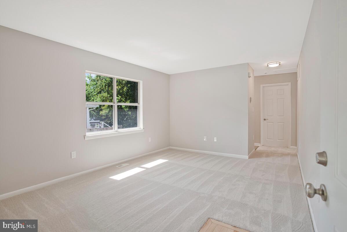 251 Cape St John Road Annapolis, MD 21401 - Photo 16 of 61 an empty room with windows and entrance