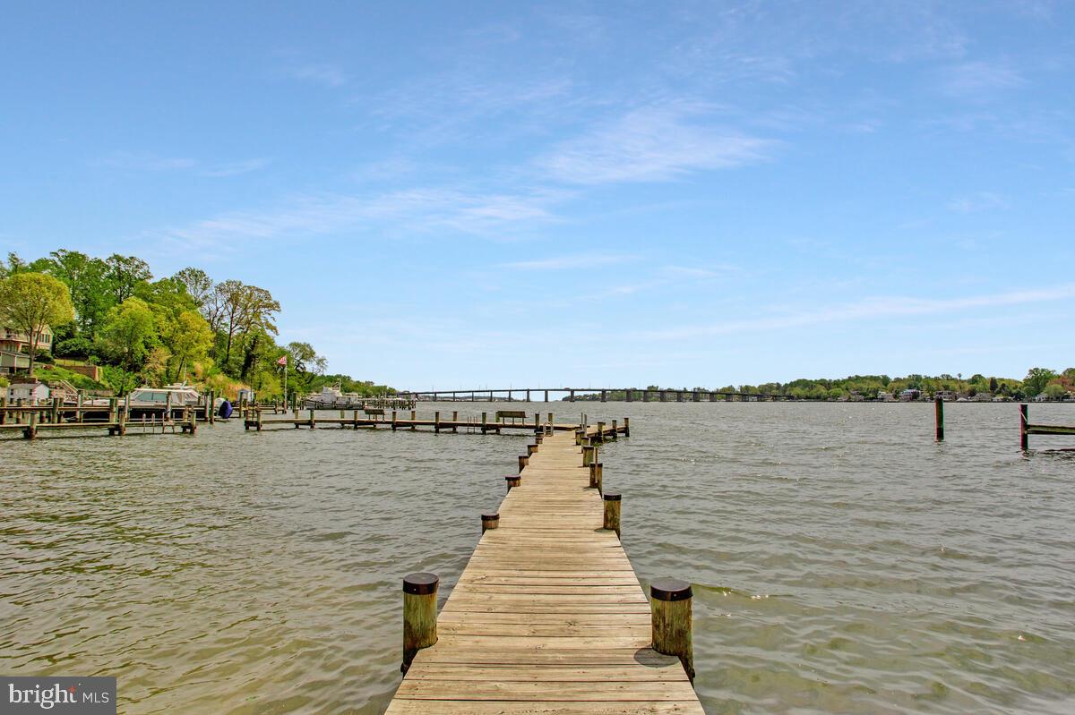 251 Cape St John Road Annapolis, MD 21401 - Photo 2 of 61 a wooden pier with boats in a lake