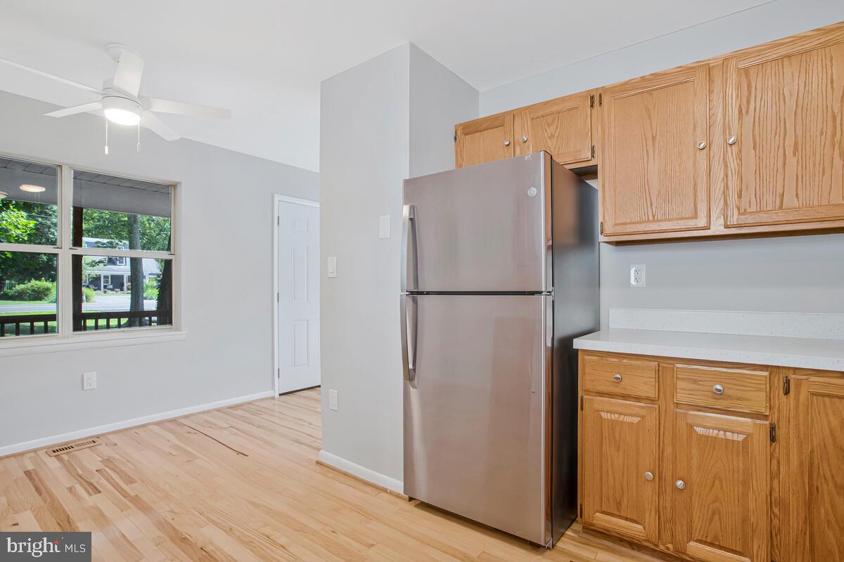 251 Cape St John Road Annapolis, MD 21401 - Photo 28 of 61 a white refrigerator freezer sitting inside of a kitchen