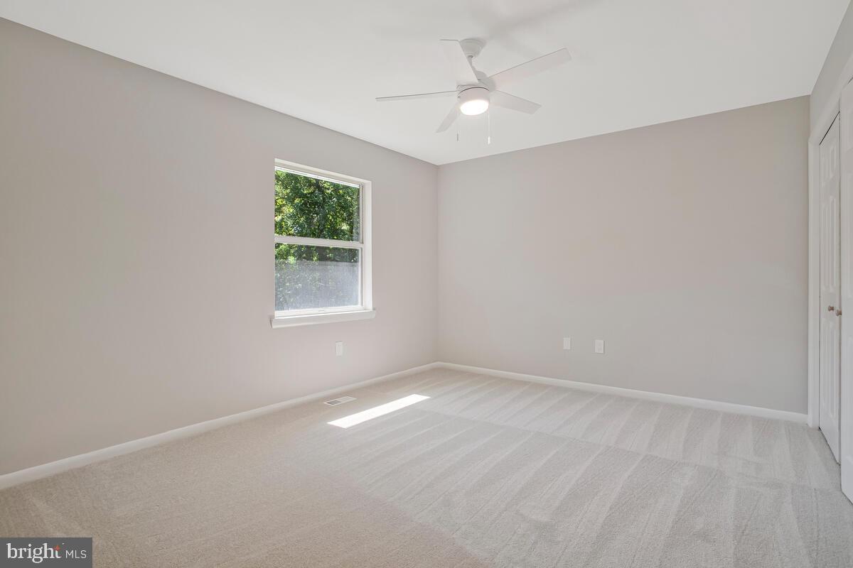 251 Cape St John Road Annapolis, MD 21401 - Photo 32 of 61 an empty room with windows and fan