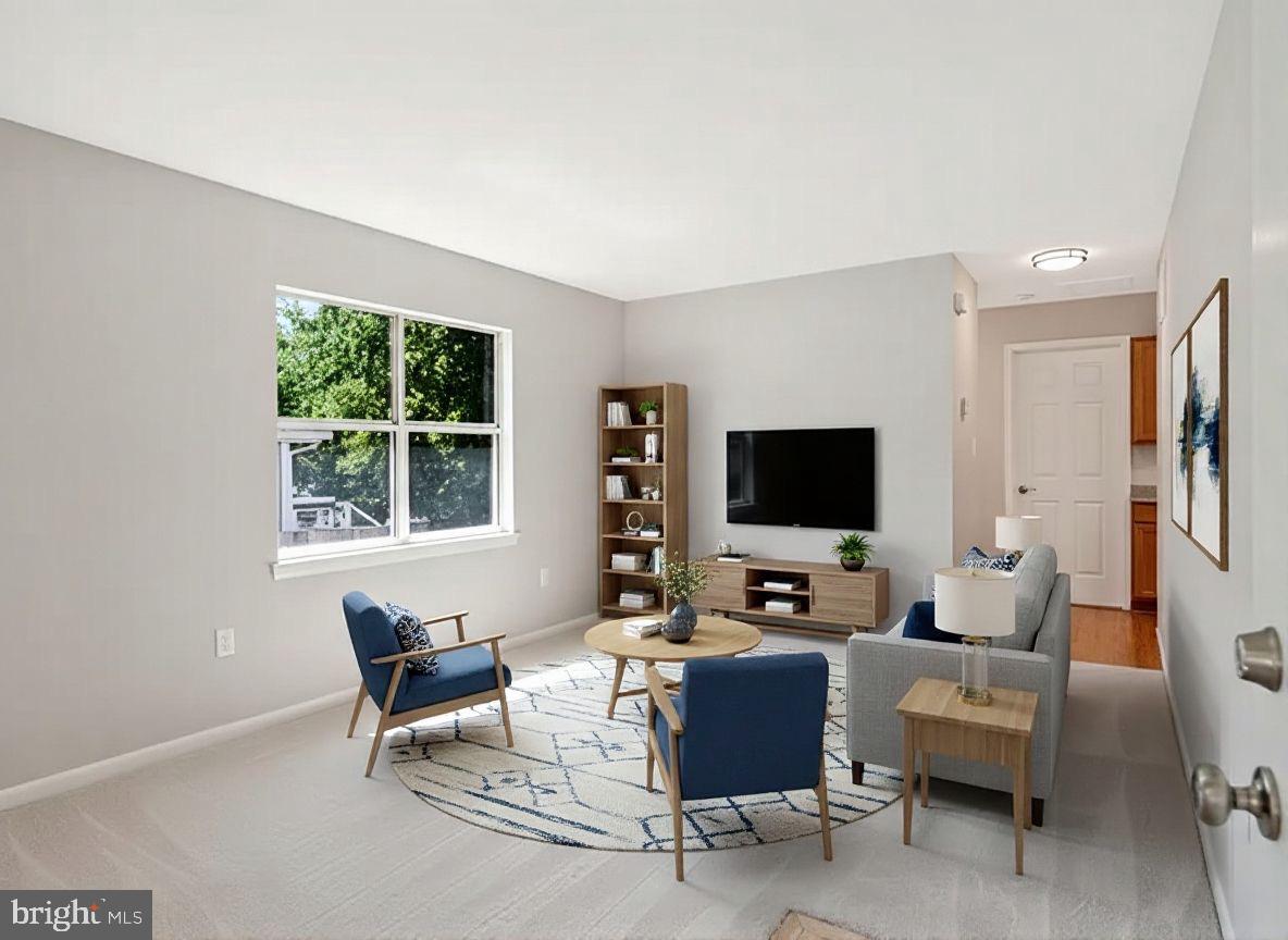 251 Cape St John Road Annapolis, MD 21401 - Photo 10 of 61 a living room with furniture and a flat screen tv