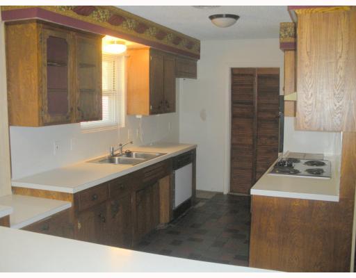124 Fulton Place Portland, TX 78374 - Photo 3 of 8 a bathroom with a sink and a mirror