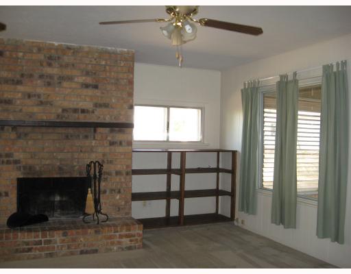 124 Fulton Place Portland, TX 78374 - Photo 4 of 8 a view of a livingroom with furniture and a fireplace