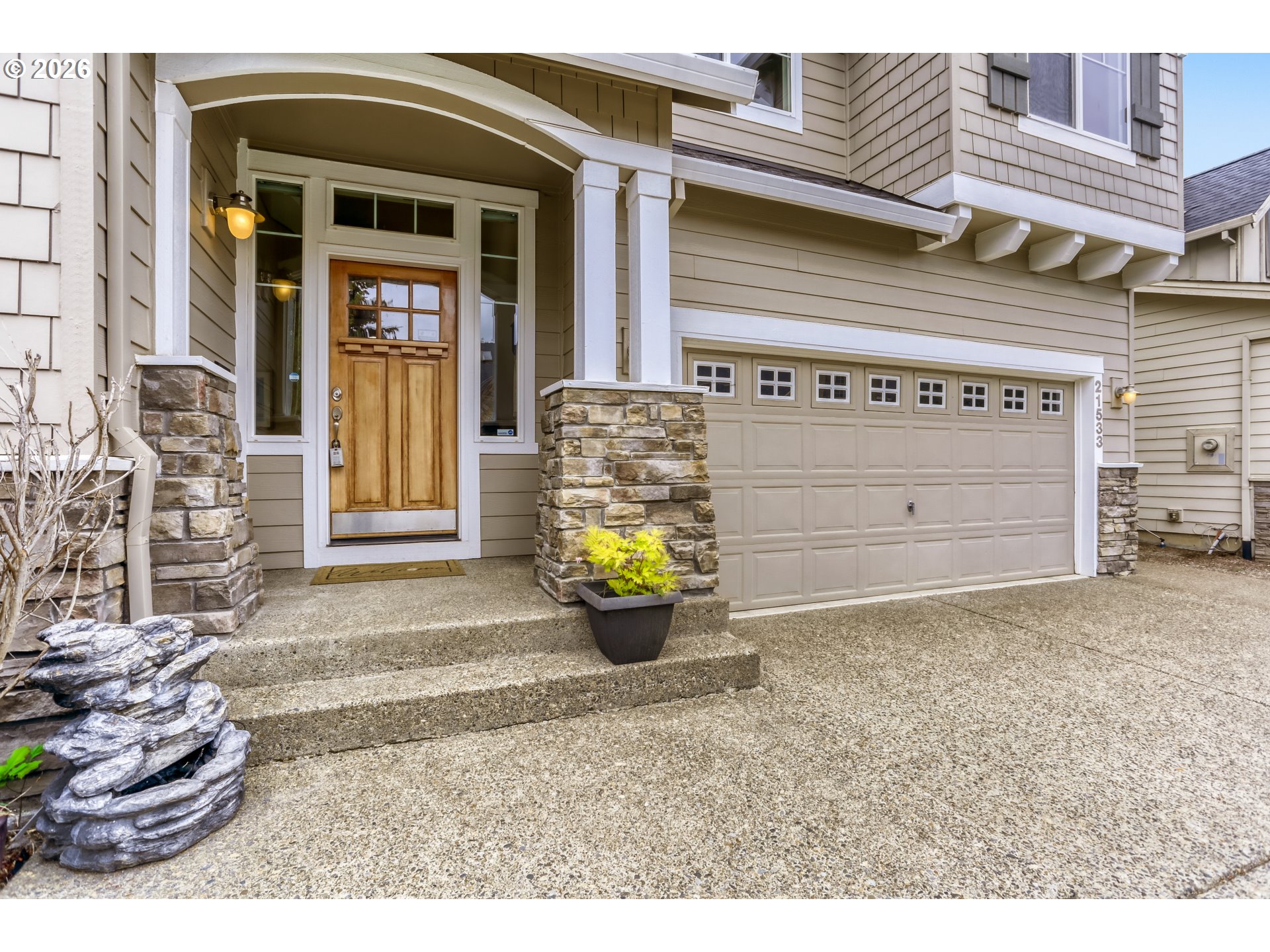 21533 Southwest Susan Lane Beaverton, OR 97003 - Photo 1 of 31 a front view of a house with barbeque