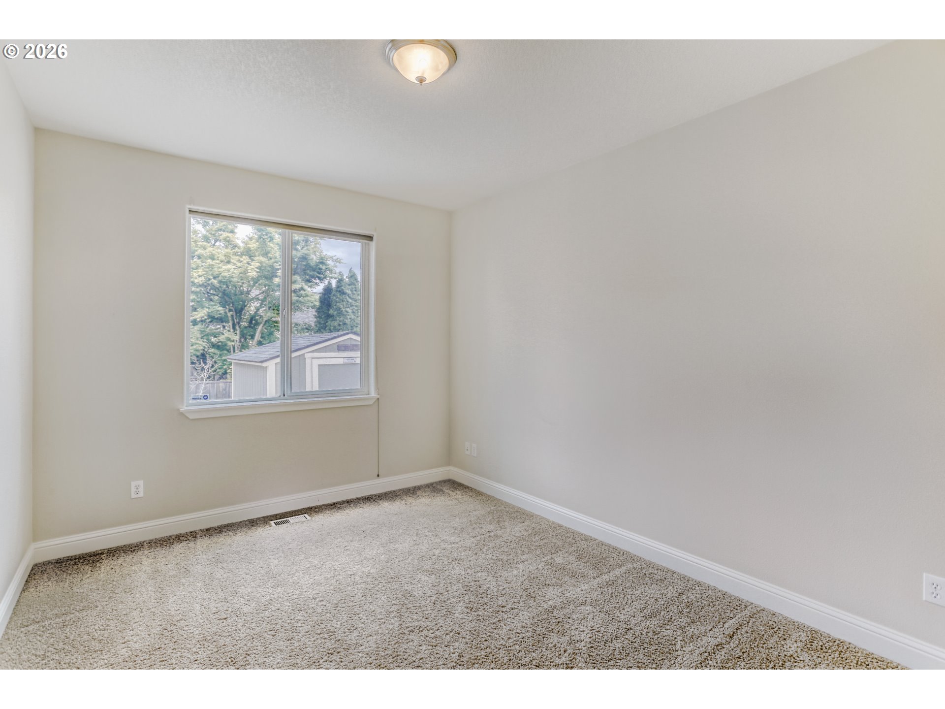 21533 Southwest Susan Lane Beaverton, OR 97003 - Photo 17 of 31 an empty room with windows