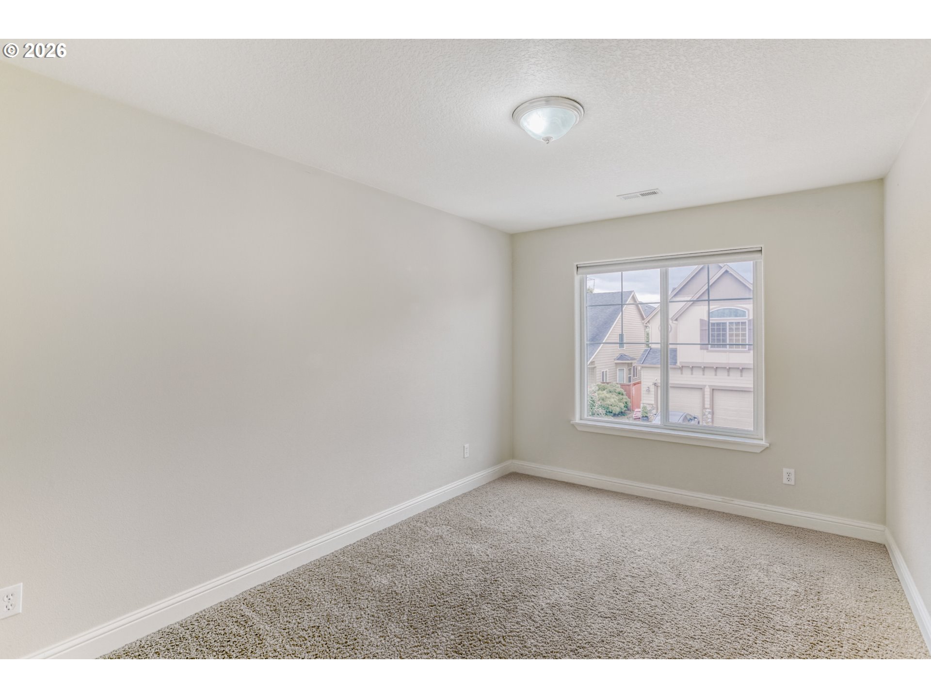 21533 Southwest Susan Lane Beaverton, OR 97003 - Photo 19 of 31 an empty room with windows