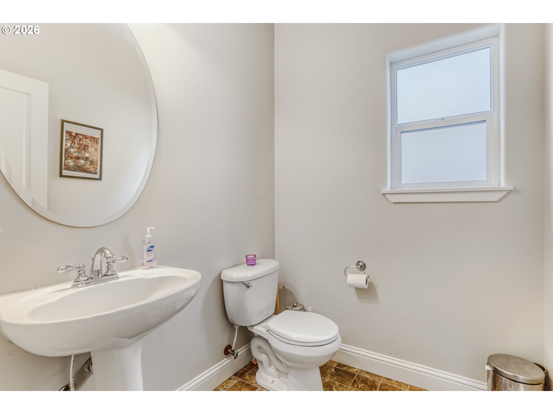 21533 Southwest Susan Lane Beaverton, OR 97003 - Photo 21 of 31 a bathroom with a toilet sink and mirror