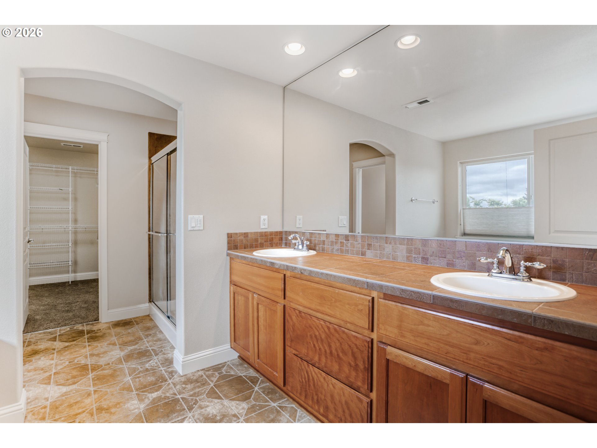 21533 Southwest Susan Lane Beaverton, OR 97003 - Photo 22 of 31 a bathroom with a sink double vanity and a mirror