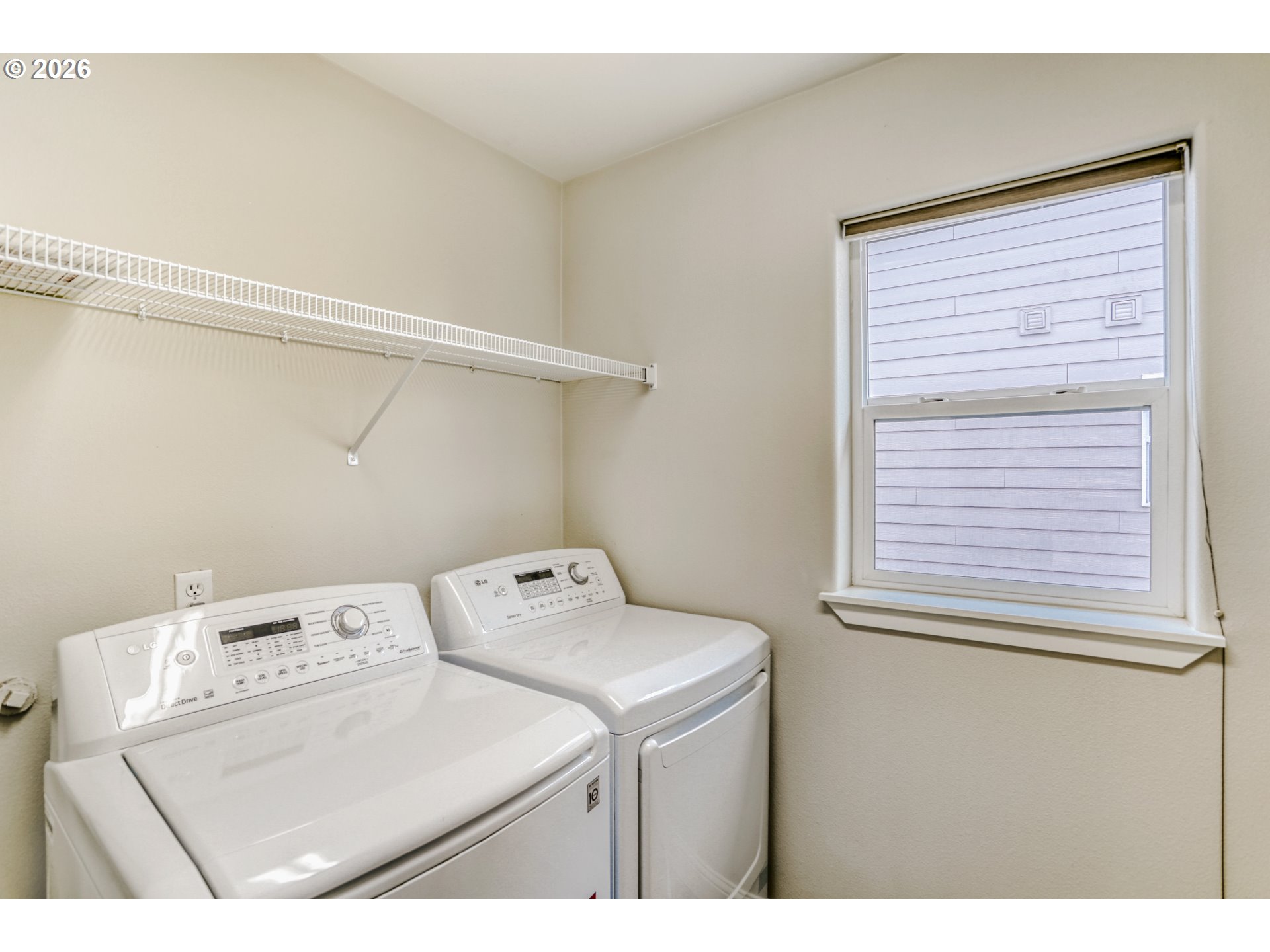 21533 Southwest Susan Lane Beaverton, OR 97003 - Photo 25 of 31 a utility room with dryer and washer