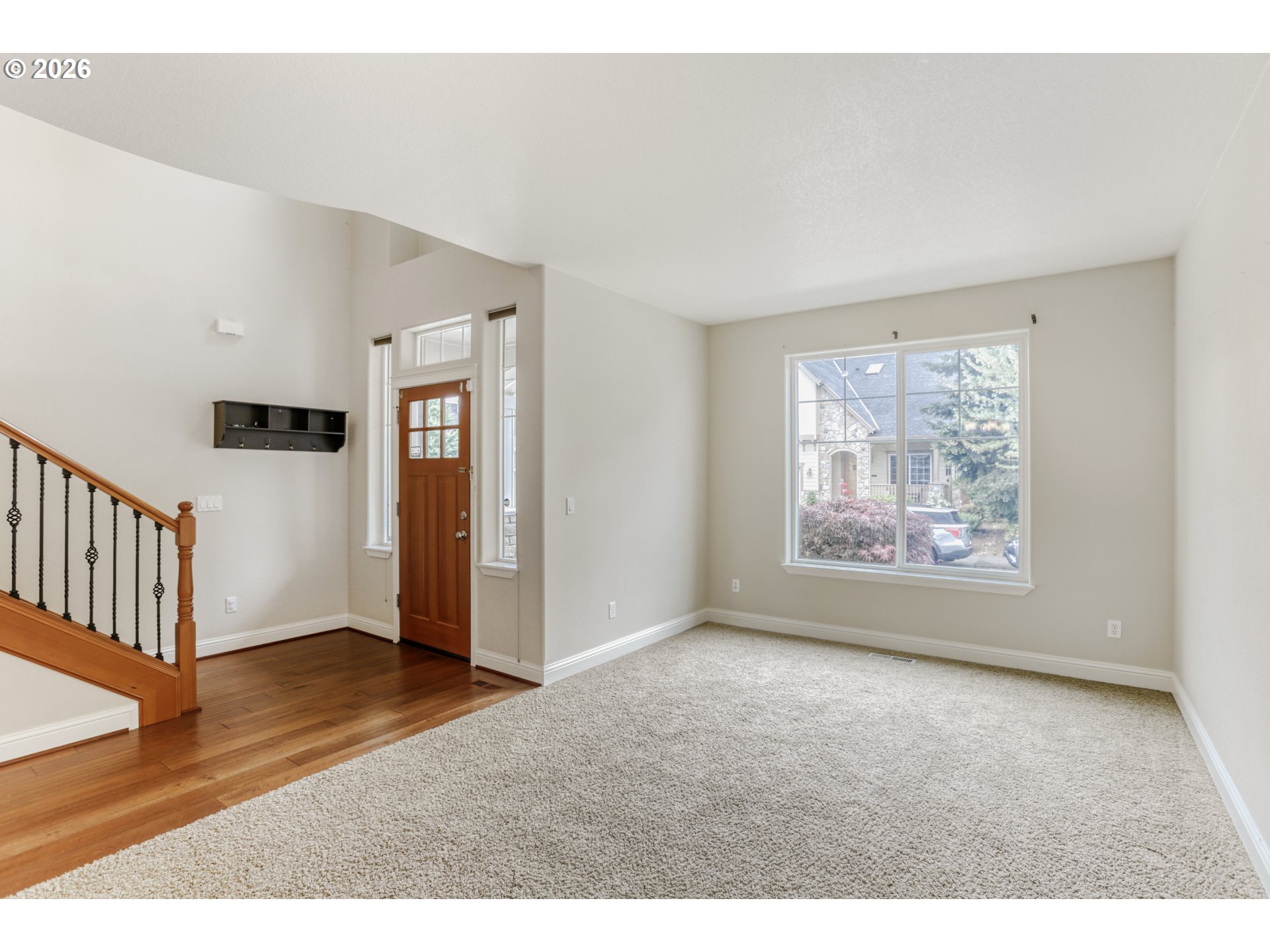 21533 Southwest Susan Lane Beaverton, OR 97003 - Photo 4 of 31 a view of an empty room with glass door