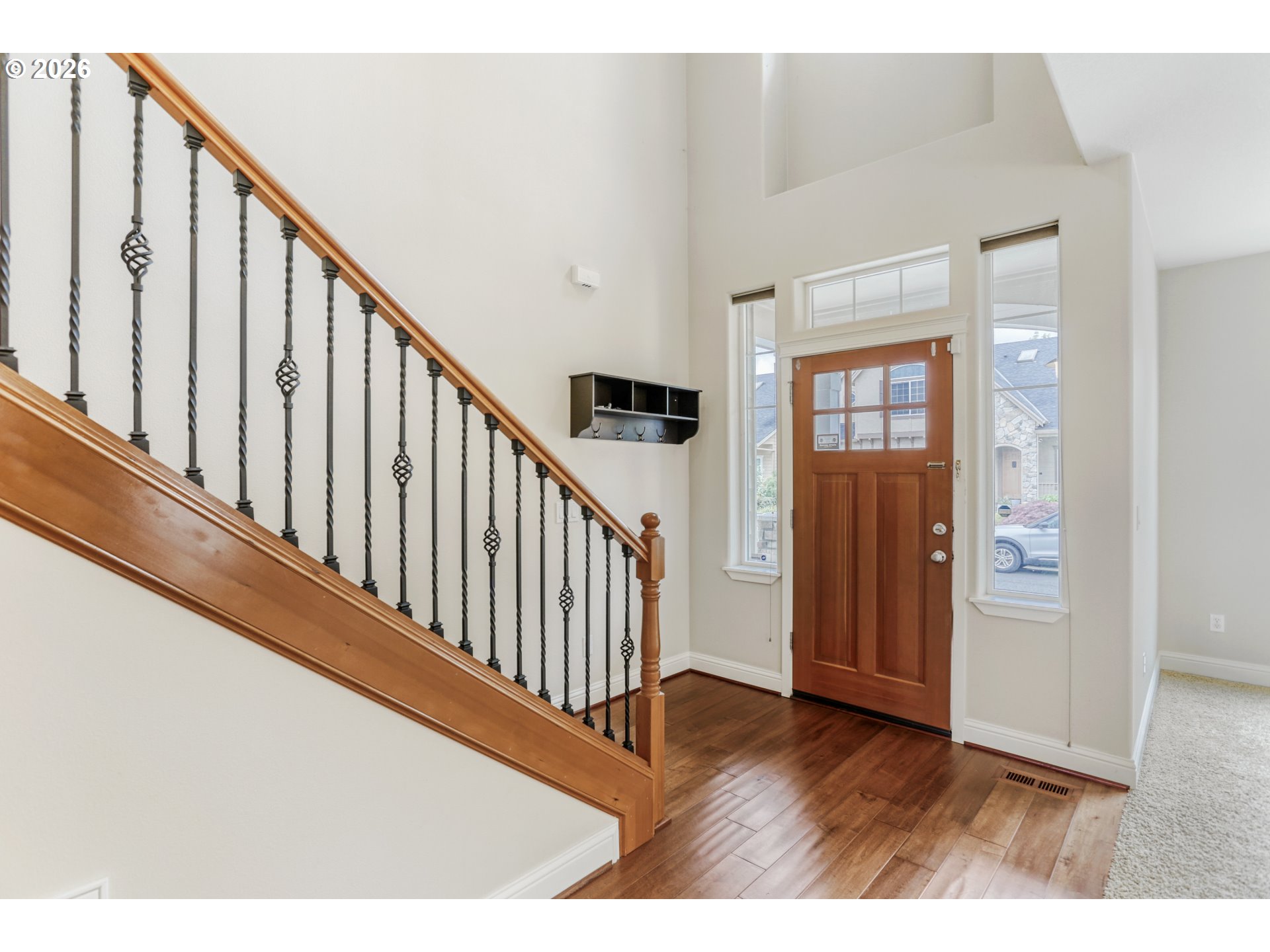 21533 Southwest Susan Lane Beaverton, OR 97003 - Photo 5 of 31 a view of staircase with railing and white walls