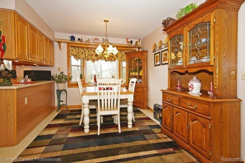 110 East Coon Lake Road Howell, MI 48843 - Photo 10 of 20 110 E Coon Lk - Dining Room.JPG