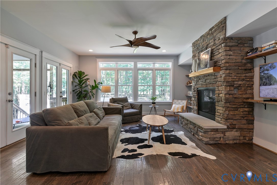 9749 Hoke Brady Road Henrico, VA 23231 - Photo 29 of 53 a living room with furniture and a fireplace