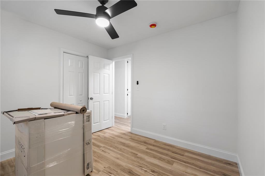 1969 Valley Ridge Drive Southwest Atlanta, GA 30331 - Photo 23 of 37 a kitchen with granite countertop cabinets and appliances