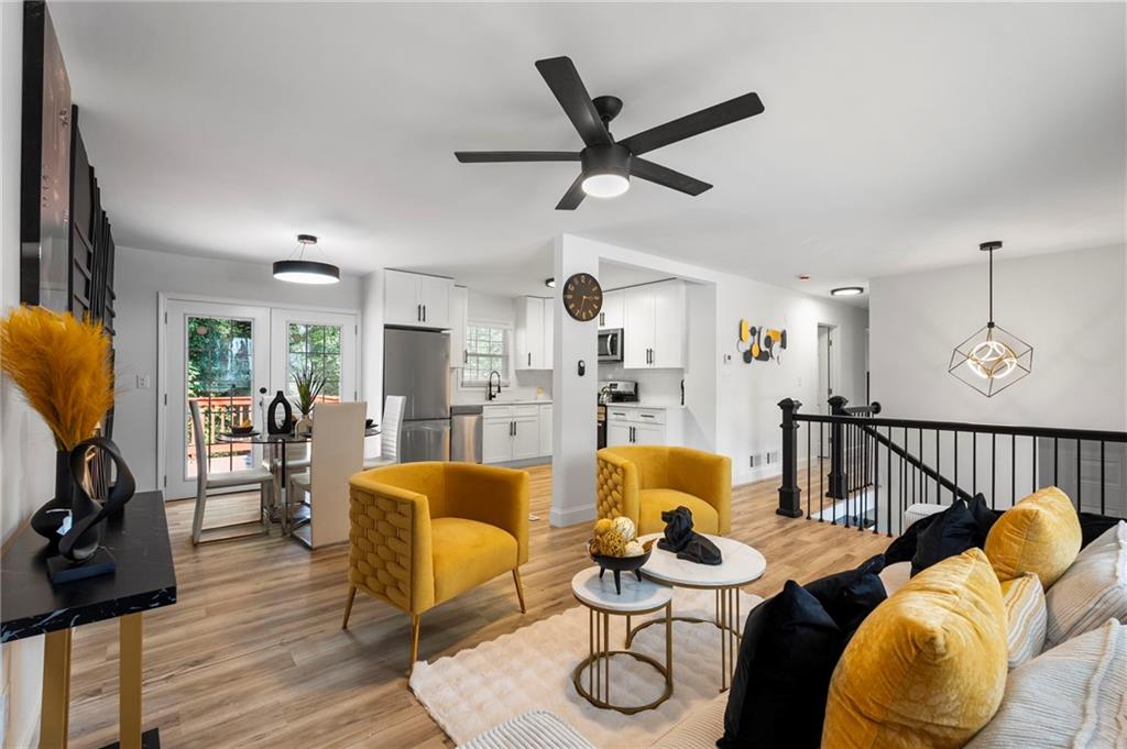 1969 Valley Ridge Drive Southwest Atlanta, GA 30331 - Photo 3 of 37 a living room with furniture kitchen view and a window
