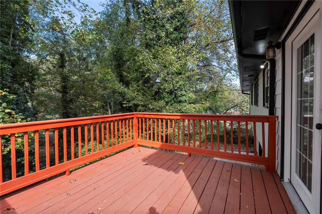 1969 Valley Ridge Drive Southwest Atlanta, GA 30331 - Photo 4 of 37 a view of balcony with wooden floor and fence