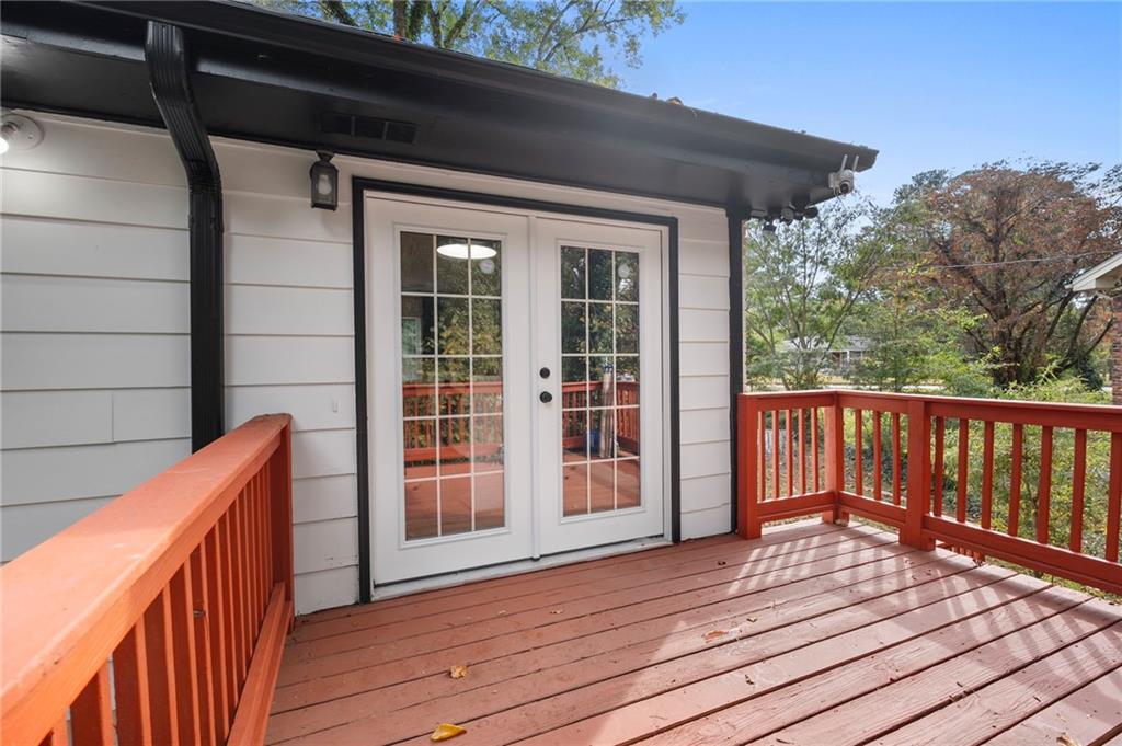 1969 Valley Ridge Drive Southwest Atlanta, GA 30331 - Photo 5 of 37 a view of deck with wooden floor and outdoor space