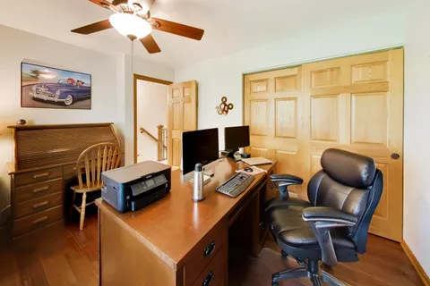 a bedroom with furniture and a window